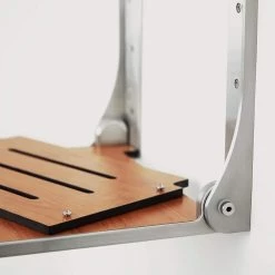 SEACHROME Silhouette Folding Wall Mount Shower Bench Seat in Teak Seat with Silver Frame 18 SEACHROME Silhouette Folding Wall Mount Shower Bench Seat in Teak Seat with Silver Frame -Toilet Storage Shop teak seat with silver frame seachrome shower seats shaf pts s sl fa 1000